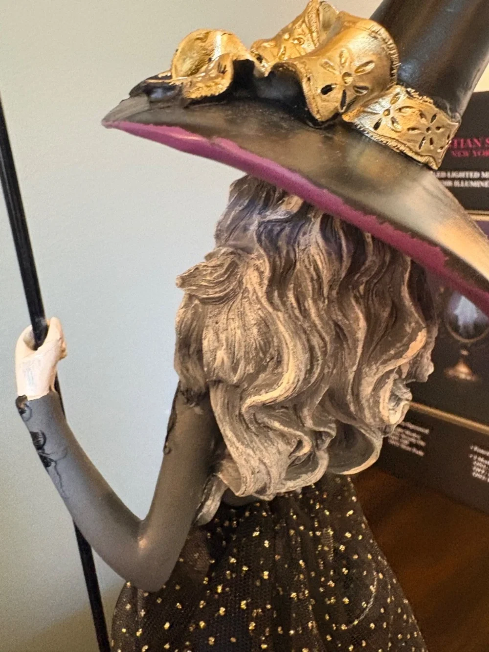 Elegant Black Witch Figurine with Purple Hat - Home Accents